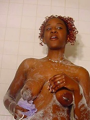 Black chick Shyshy shows her shaved pussy