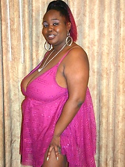 Ebony BBW model flaunts her big tits and taking a big black dick in her fat covered twat
