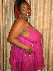 Ebony BBW model flaunts her big tits and taking a big black dick in her fat covered twat