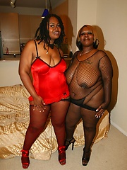 Big floppy tits on two black fatties get their pussies wet