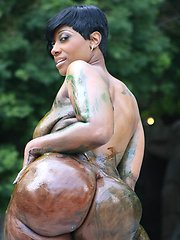 Wonderful black chick showing her painted body