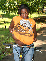 Black big tits topless ride in the park
