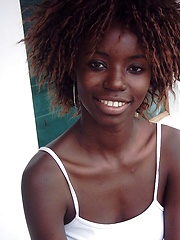 Very slim black cutie uncovers the nudity