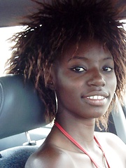 Very slim black cutie uncovers the nudity