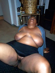 Full black girl posing at home